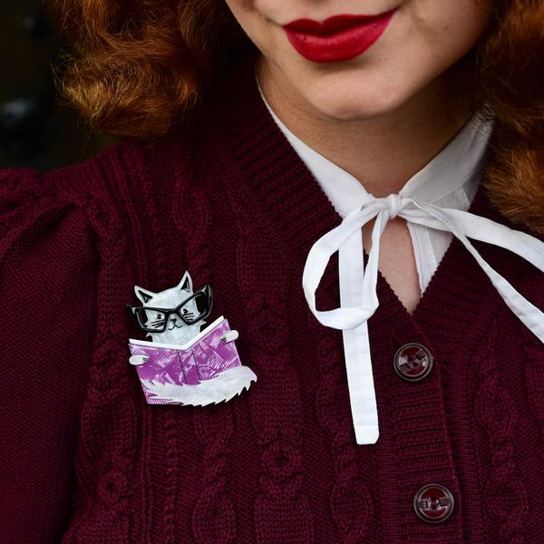 Erstwilder - Puss in Books Brooch (2021) pink - 20th Century Artifacts